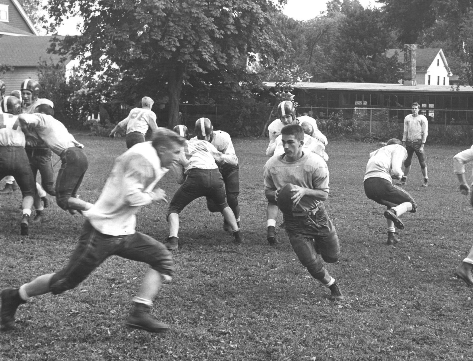 men play football